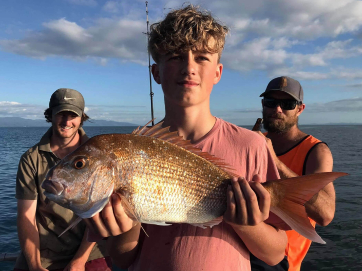 image of a boy snapper fishing